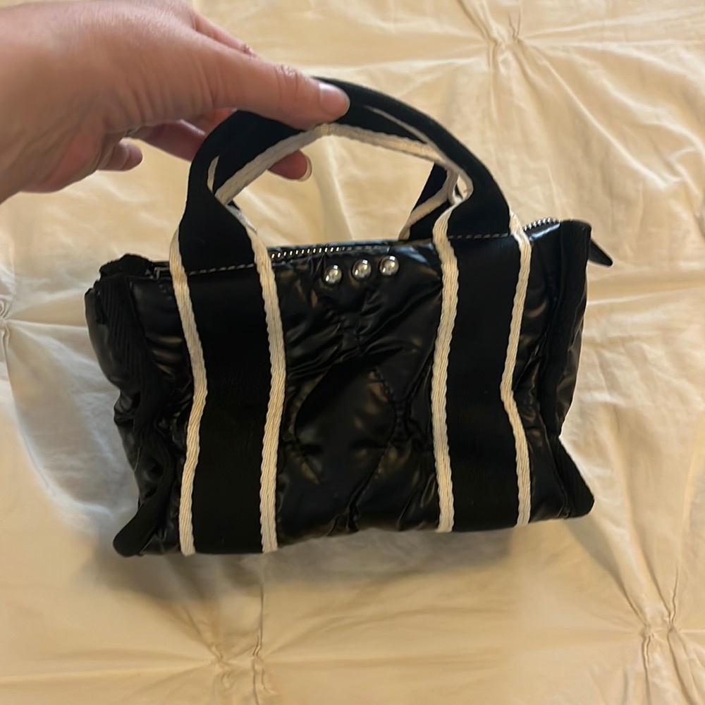 Adorable micro purse! Cross body strap included